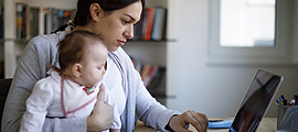 mom and baby using laptop