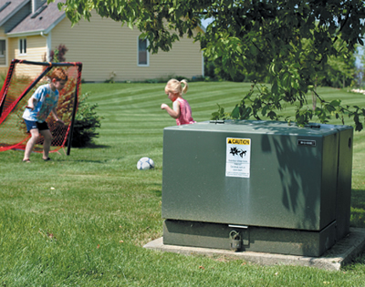 green transformer box in yard