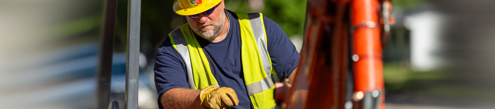 wps employee digging with excavator